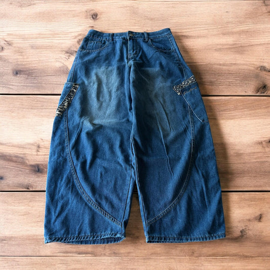 Incredible vintage style baggy wide leg skater fit jeans with leopard print in mid blue.