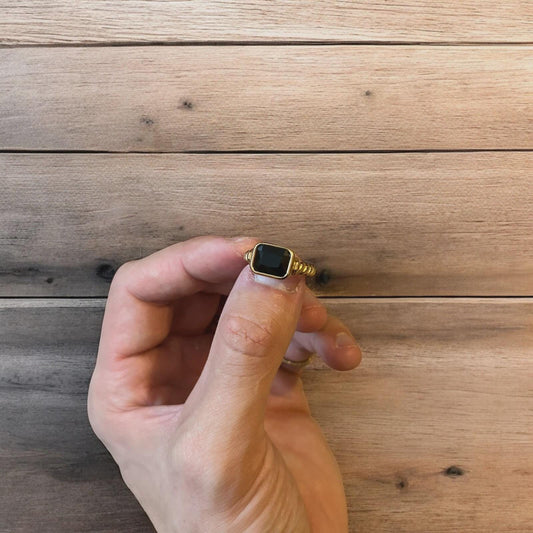 Lovely vintage style gold ring with black gemstone.