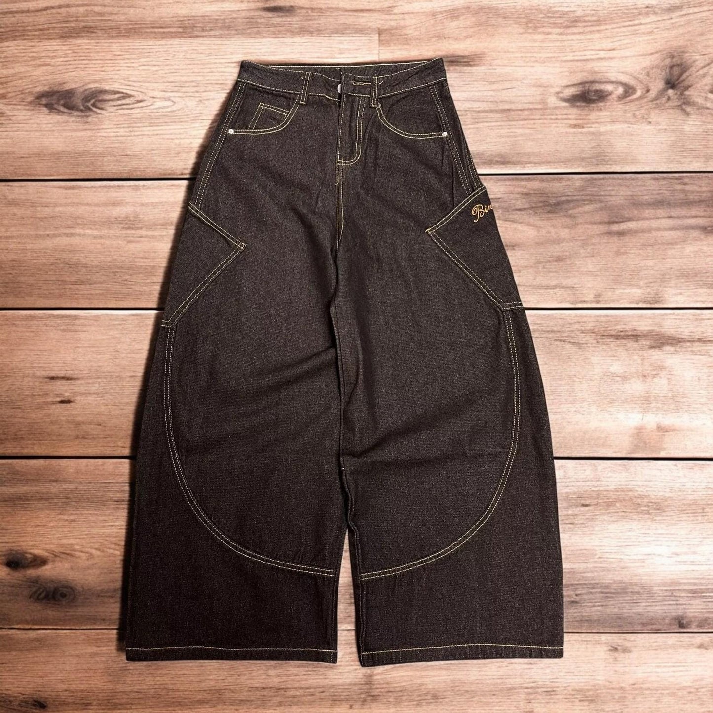 Incredible vintage style baggy wide leg skater fit jeans with embroidery in mid black.