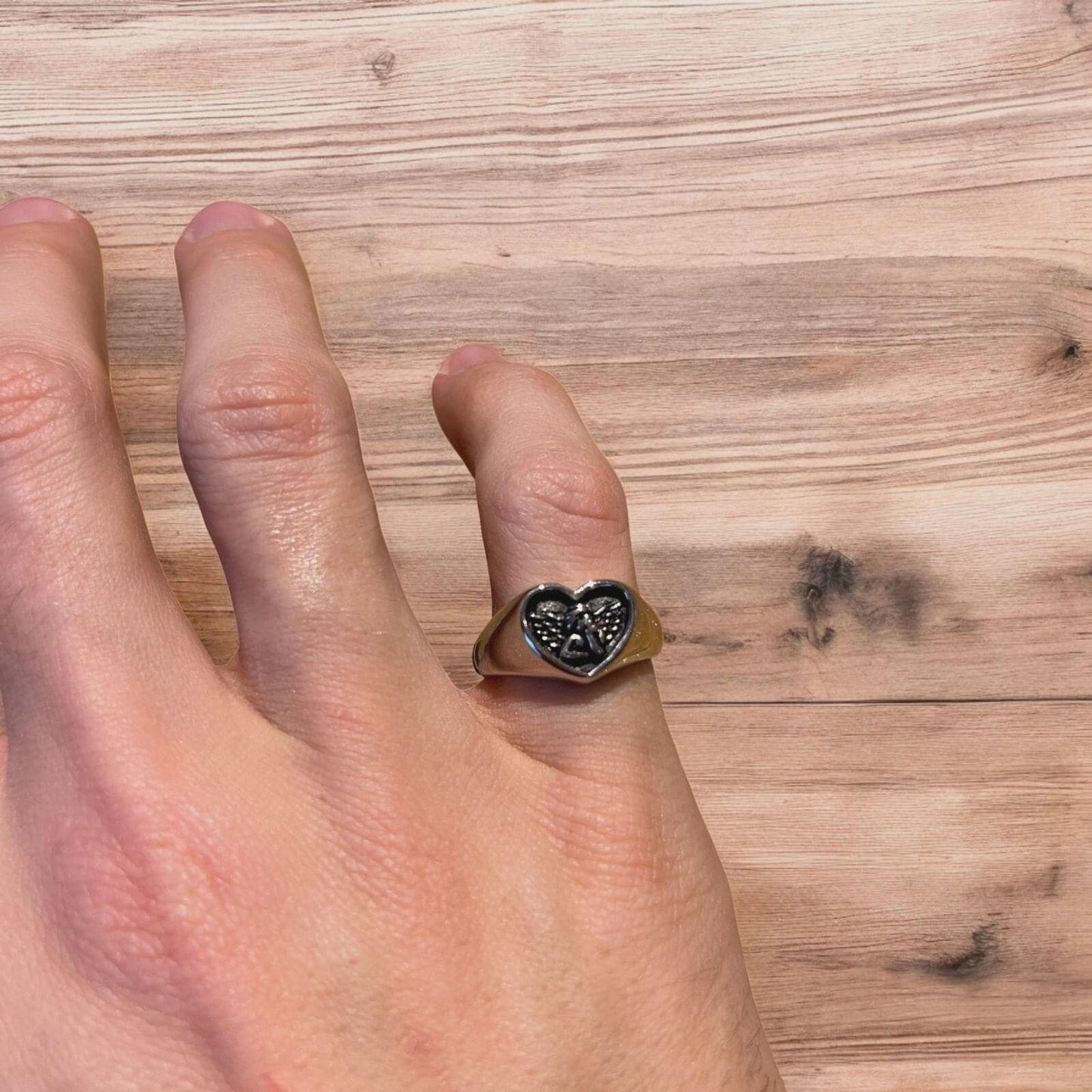 Lovely vintage style stainless steel cupid angel heart signet ring in silver.