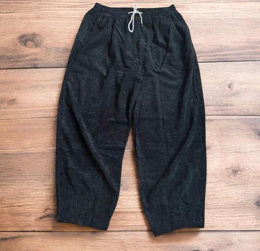 Super baggy wide leg skater corduroy trousers in black.