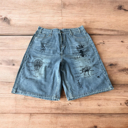 Incredible baggy wide leg denim shorts jorts with graffiti/graphic in light blue.
