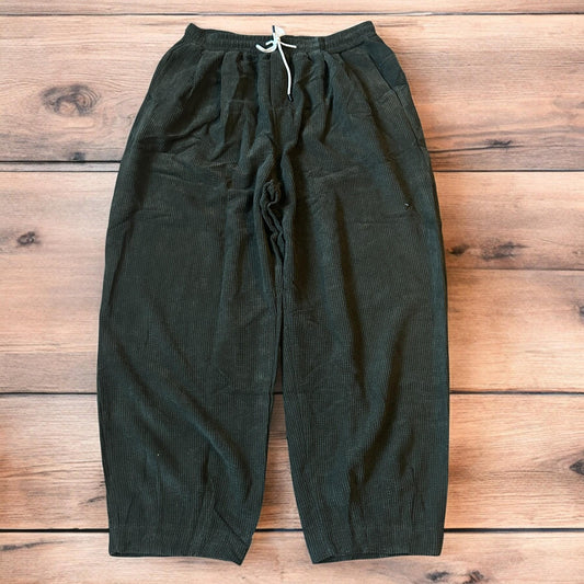 Super baggy wide leg skater corduroy trousers in khaki green.