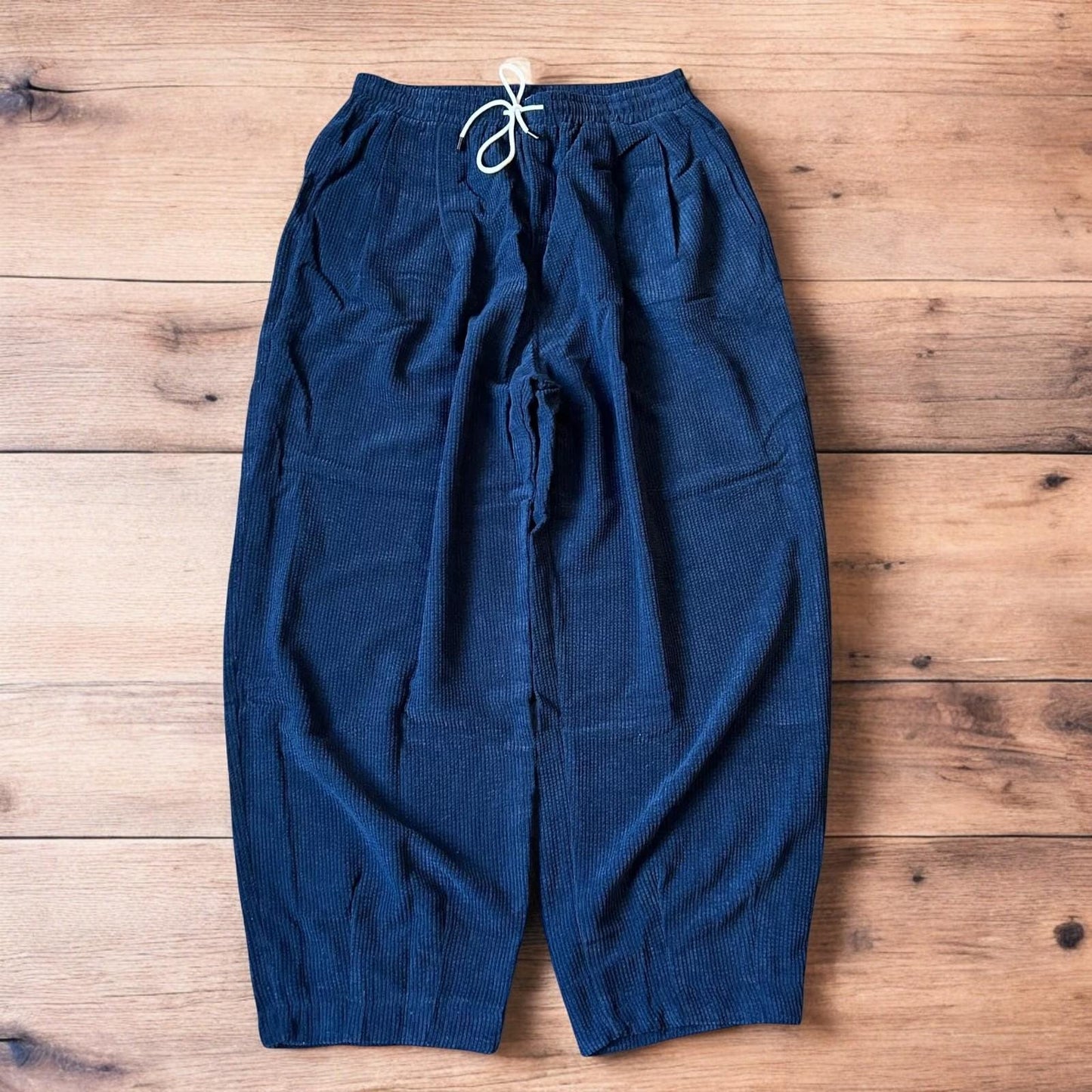 Super baggy wide leg skater corduroy trousers in navy blue.