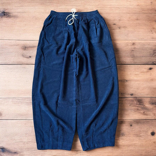 Super baggy wide leg skater corduroy trousers in navy blue.