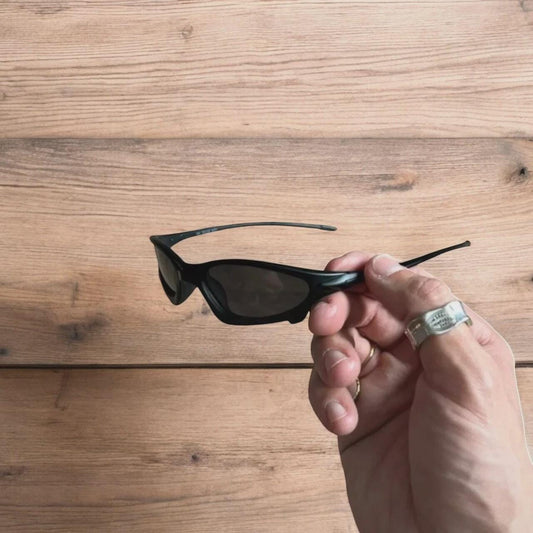 Insane polarised sunglasses in black with black lense. One size.