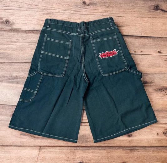 Insane super baggy long skater jean shorts jorts in black with embroidered design.