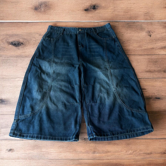 Incredible super baggy wide leg denim carpenter shorts jorts in dark blue wash.
