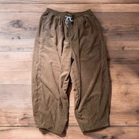 Super baggy wide leg skater corduroy trousers in beige.