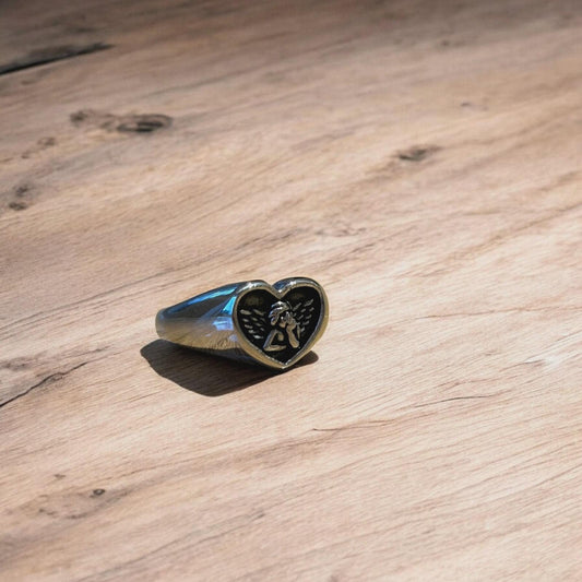 Lovely vintage style stainless steel cupid angel heart signet ring in silver.