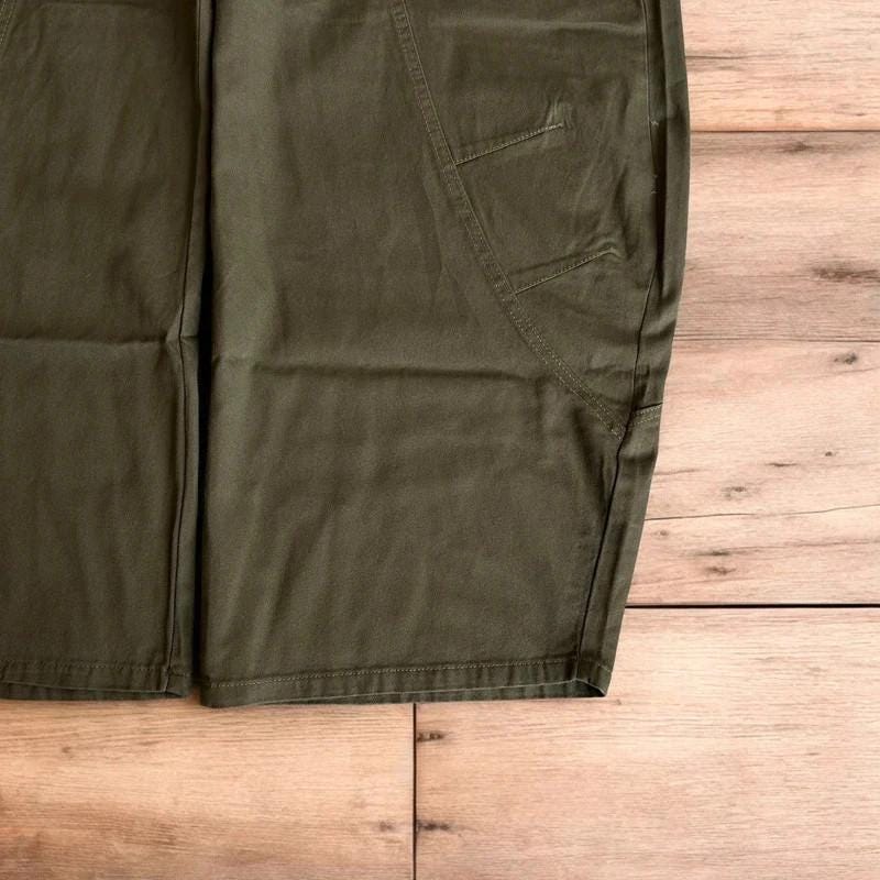 Vintage Military style baggy wide leg cargo trousers in khaki green.
