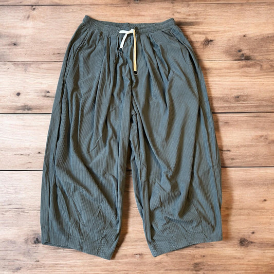 Super baggy wide leg relaxed fit corduroy trousers joggers in grey.