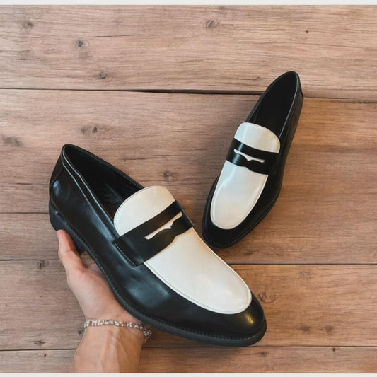Lovely classic style penny loafers shoes in black and white design.