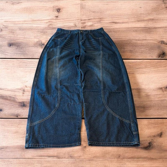 Incredible vintage style baggy wide leg skater fit jeans with fade in dark blue.