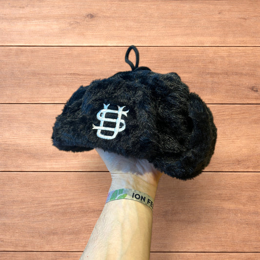 Russian ushanka trapper ear flap winter hat in black colour way.