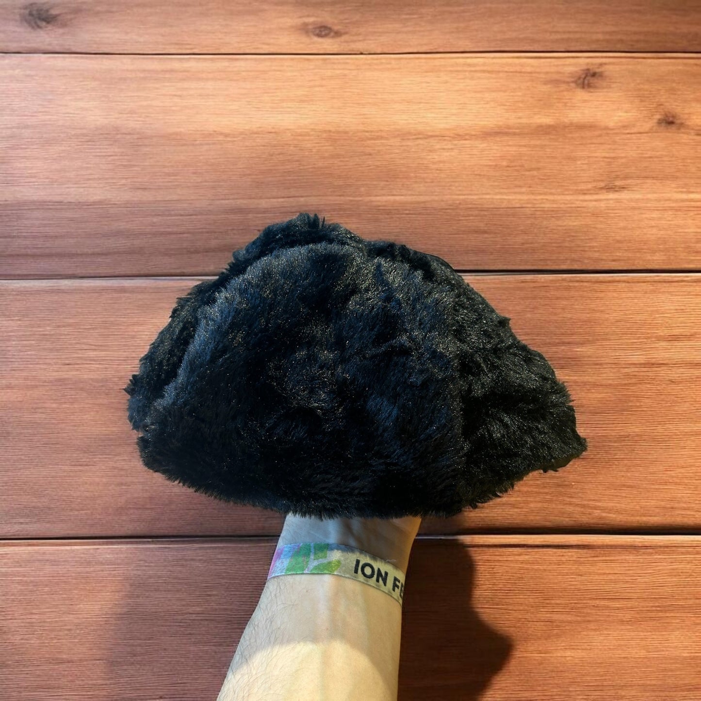Russian ushanka trapper ear flap winter hat in black colour way.