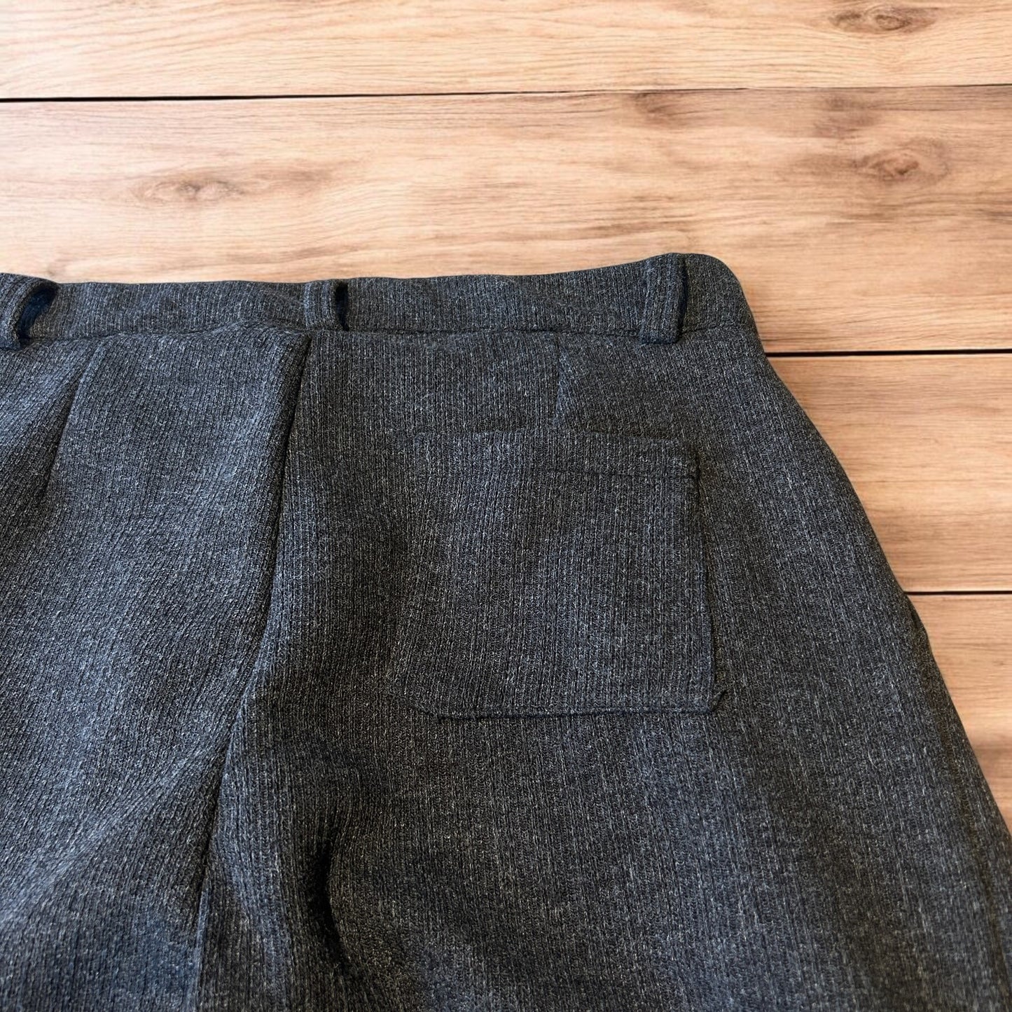 Vintage style baggy wide leg tailored wool pleated trousers in brown.