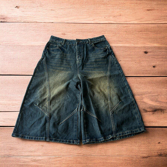 Super baggy wide leg denim carpenter shorts jorts in dark blue wash.