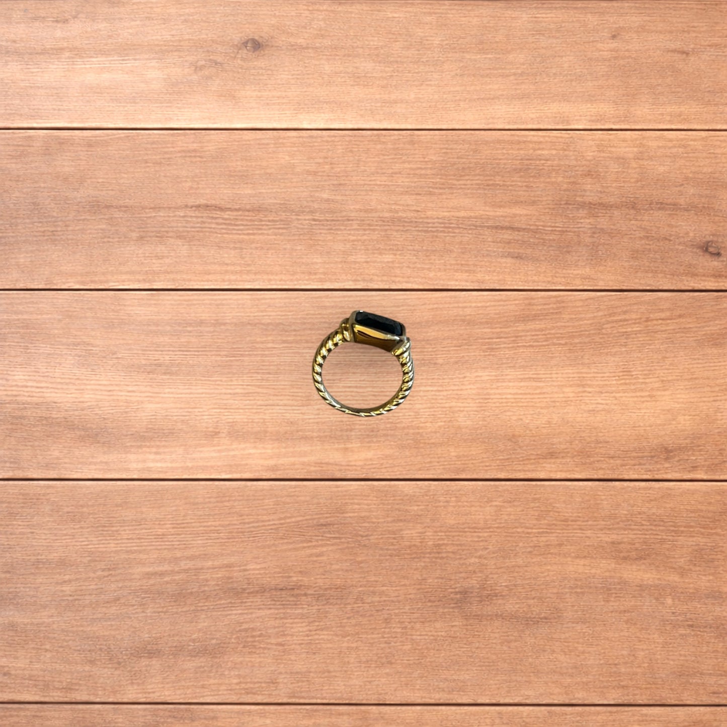 Lovely vintage style gold ring with black gemstone.