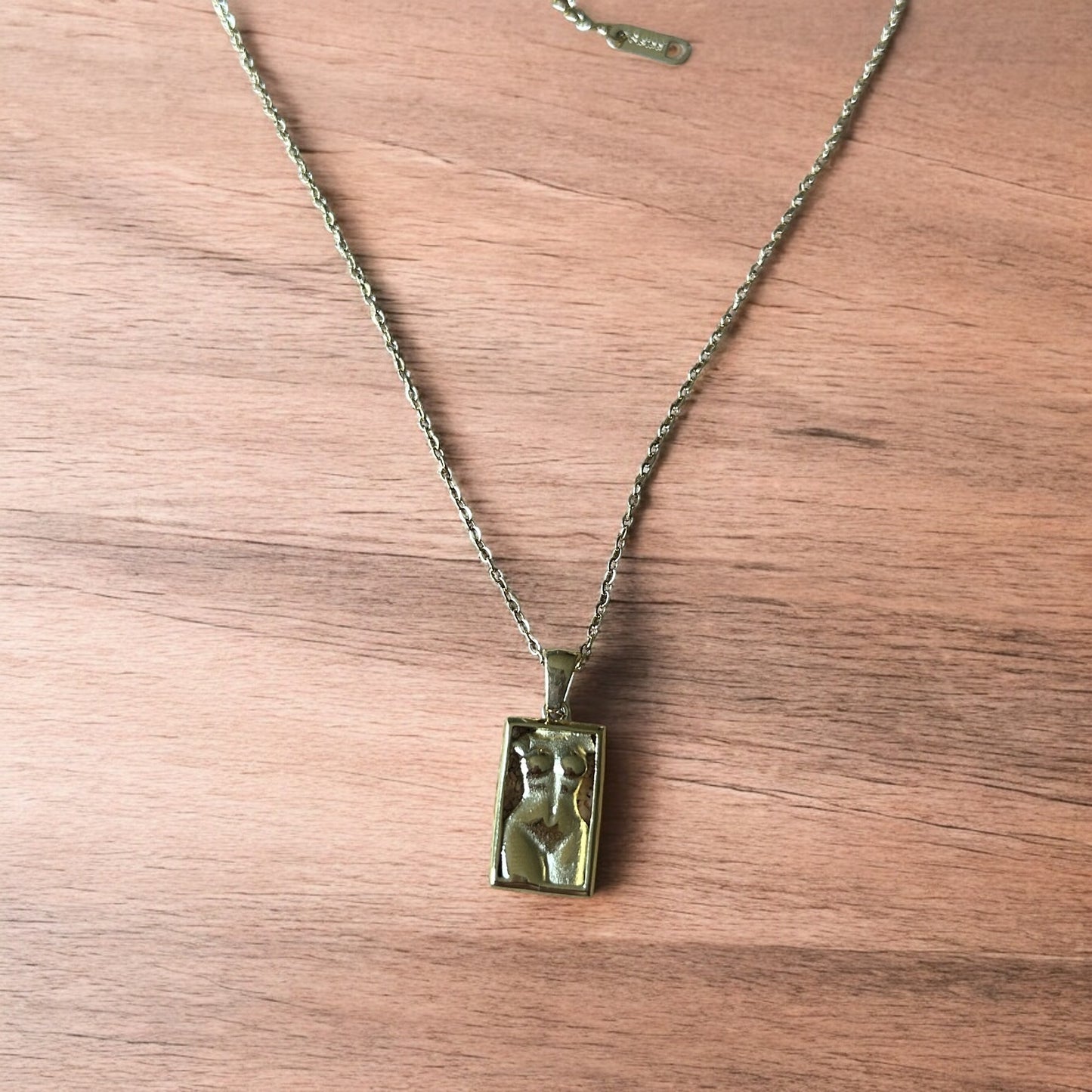 Lovely Gold stainless steel necklace of female woman figure silhouette body.