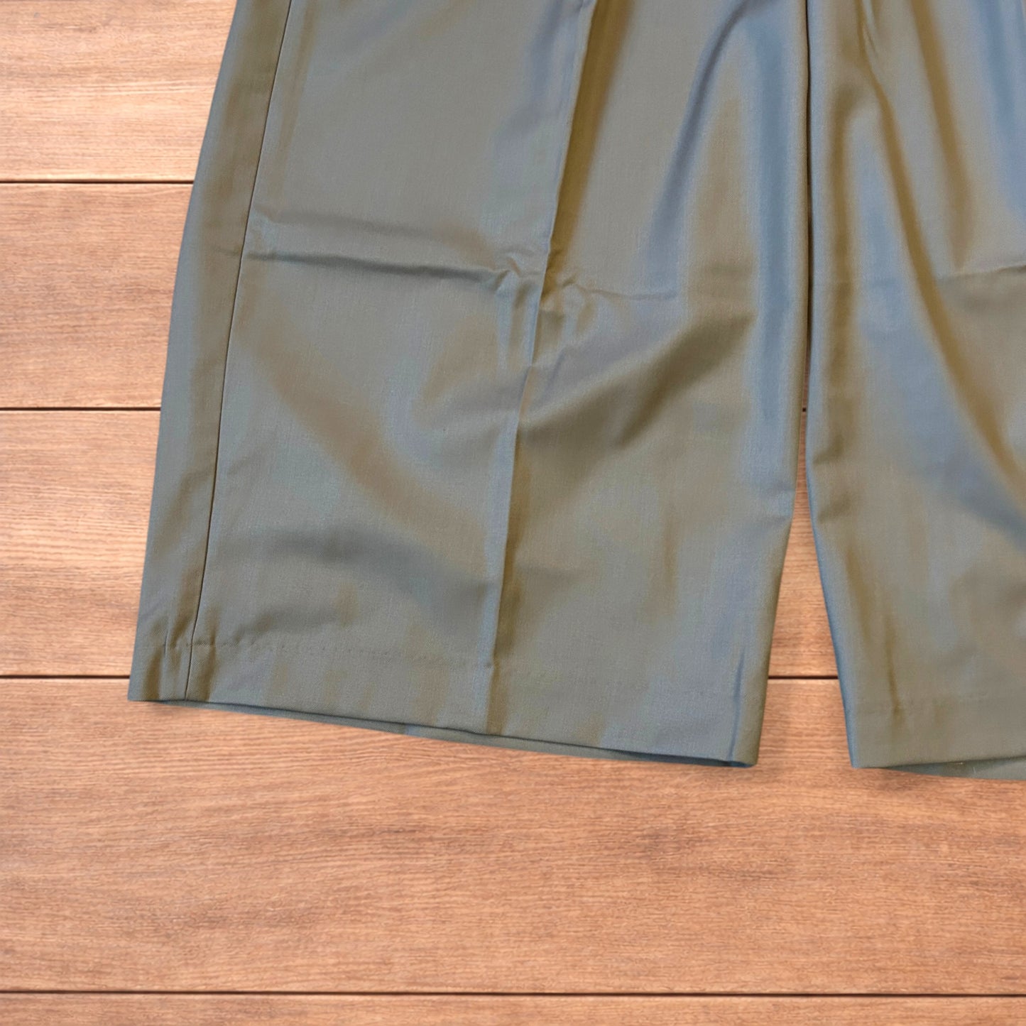 Vintage style baggy wide leg long tailored shorts in beige.