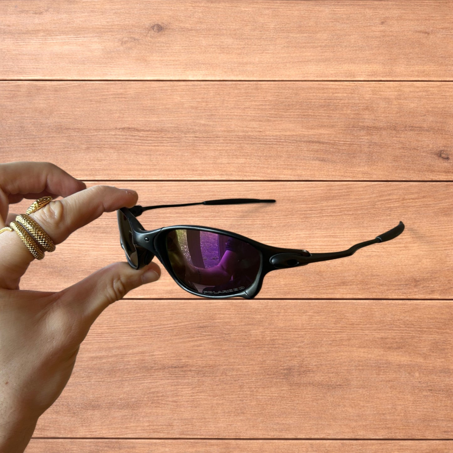 Insane metal frame polarised sunglasses in black frame purple lense.