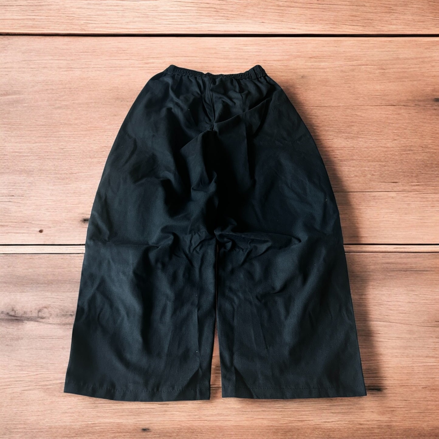 Incredible super baggy wide leg cargo trousers in black.