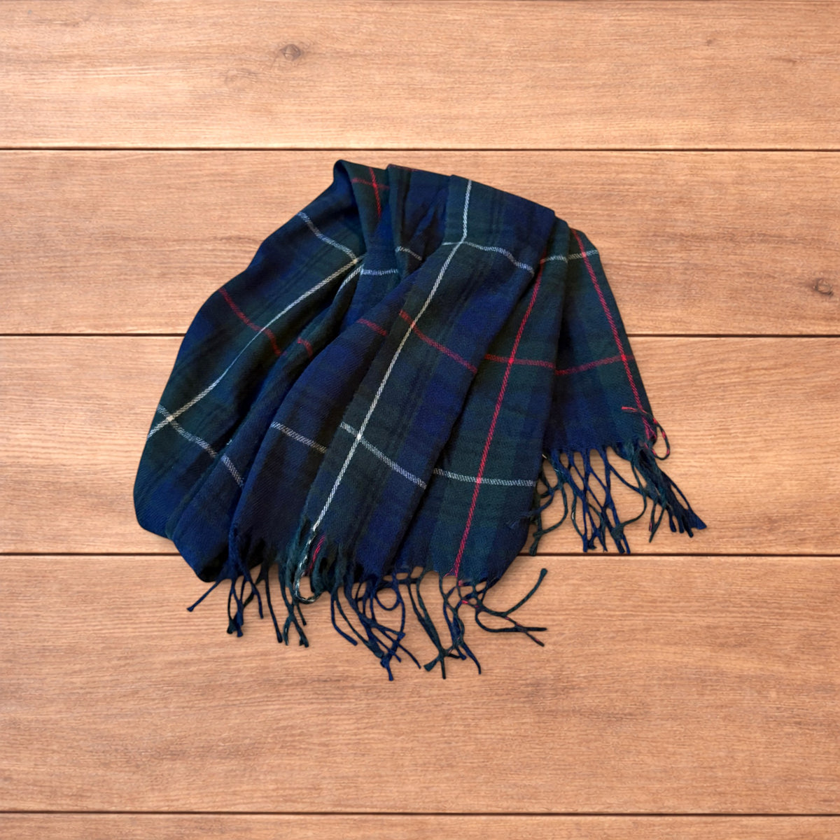 Tartan plaid cashmere scarf in dark green and navy.
