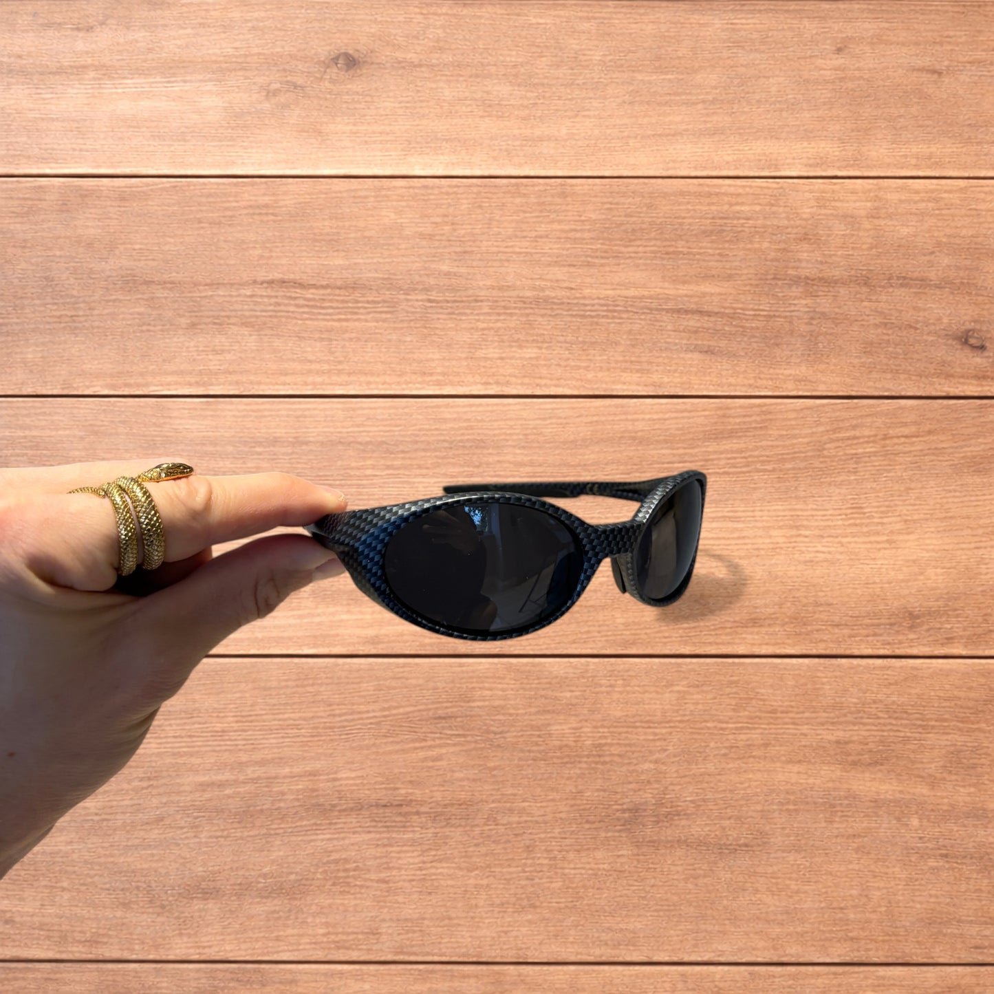 Insane mirrored polarised sunglasses in carbon graphite with black lense.