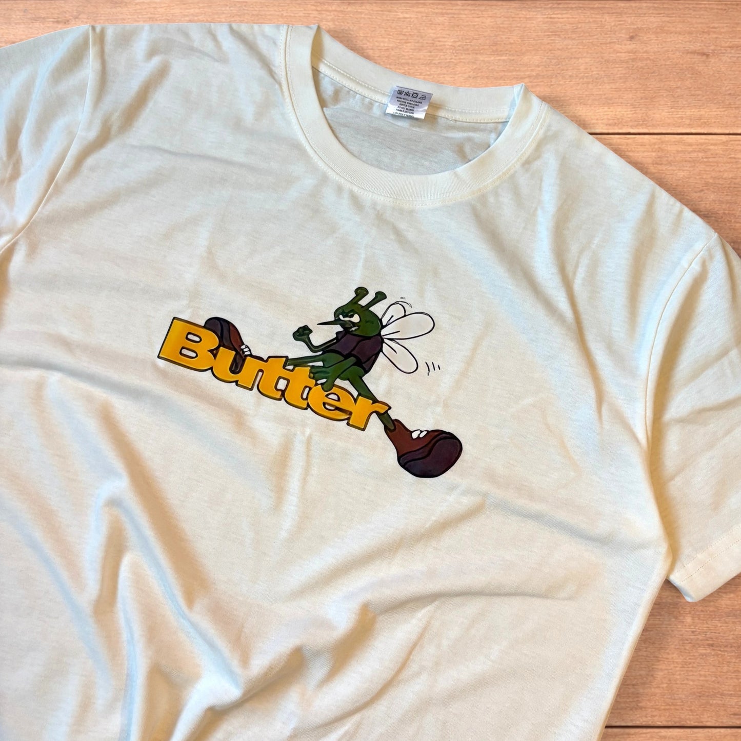 Butter skate relaxed fit graphic tshirt in white.