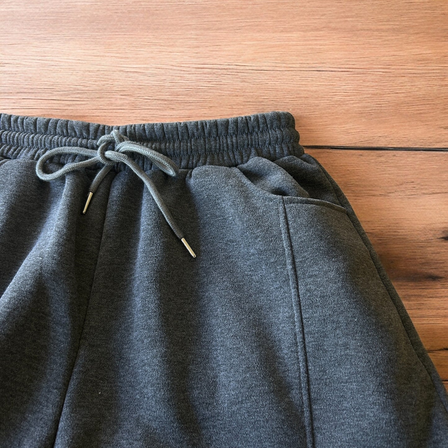 Super baggy wide leg Korean joggers in dark grey.