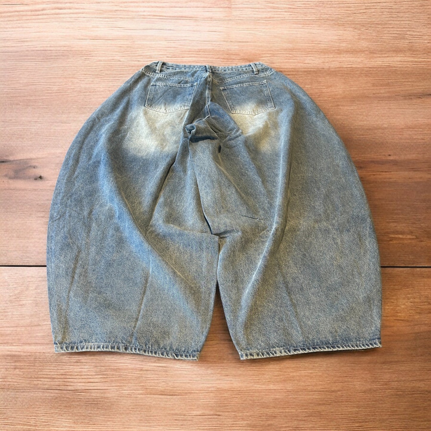 Super baggy wide leg balloon fit jeans in light blue wash.