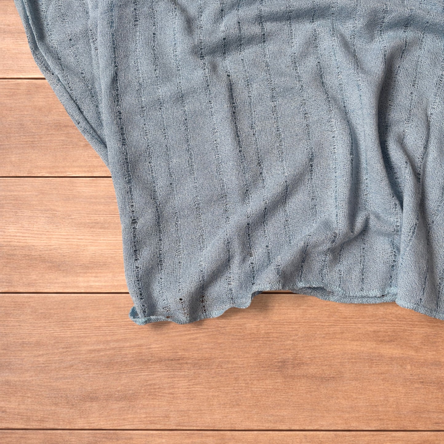 Surfer style baggy long sleeve knit top shirt in light blue.