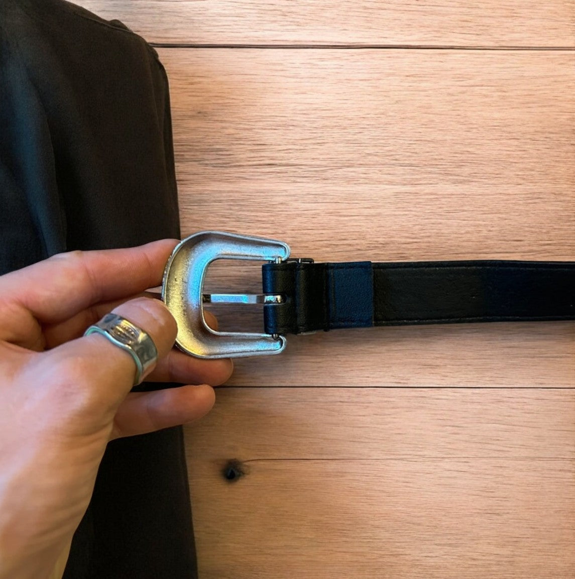 Vintage style faux leather western cowboy belt in black with silver trim. 105cm.