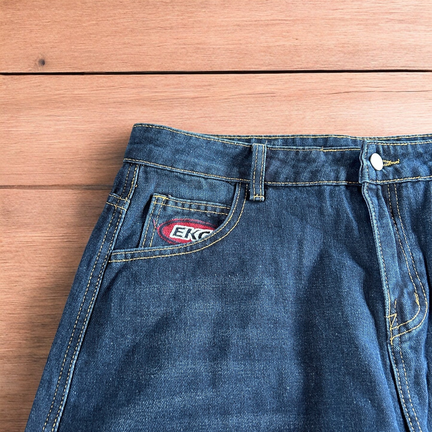 Incredible vintage style baggy wide leg skater fit cargo jeans with embroidery in mid blue.