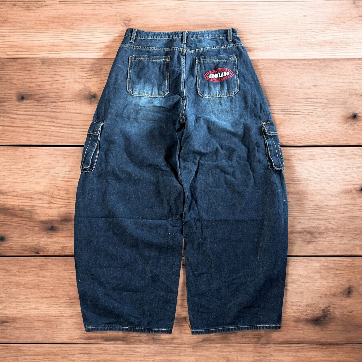 Incredible vintage style baggy wide leg skater fit cargo jeans with embroidery in mid blue.