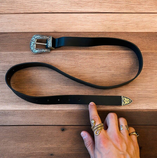 Vintage style faux leather western cowboy belt in black with silver trim. 100cm.