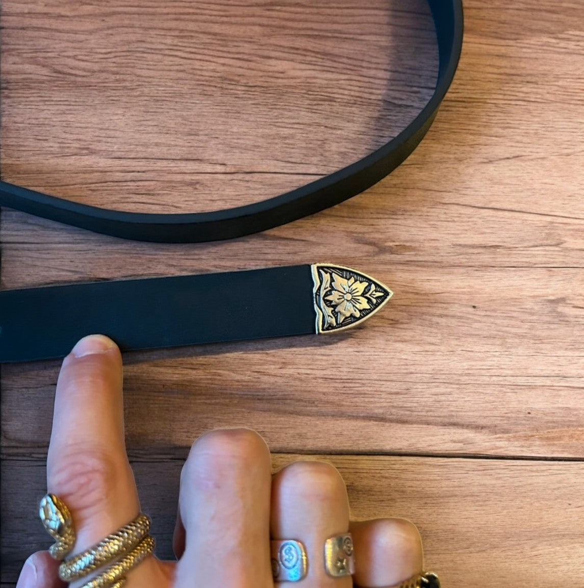 Vintage style faux leather western cowboy belt in black with silver trim. 100cm.