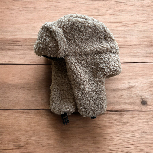 Lovely wool style fluffy Russian ear flap winter hat in brown. One size.