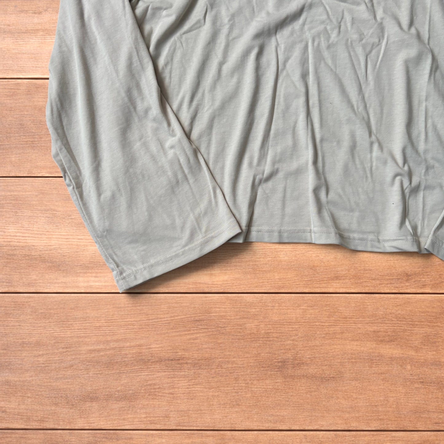 Relaxed fit Henley long sleeve top tshirt in beige.