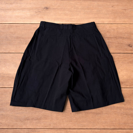 Super baggy wide tailored pleated linen shorts jorts in black.