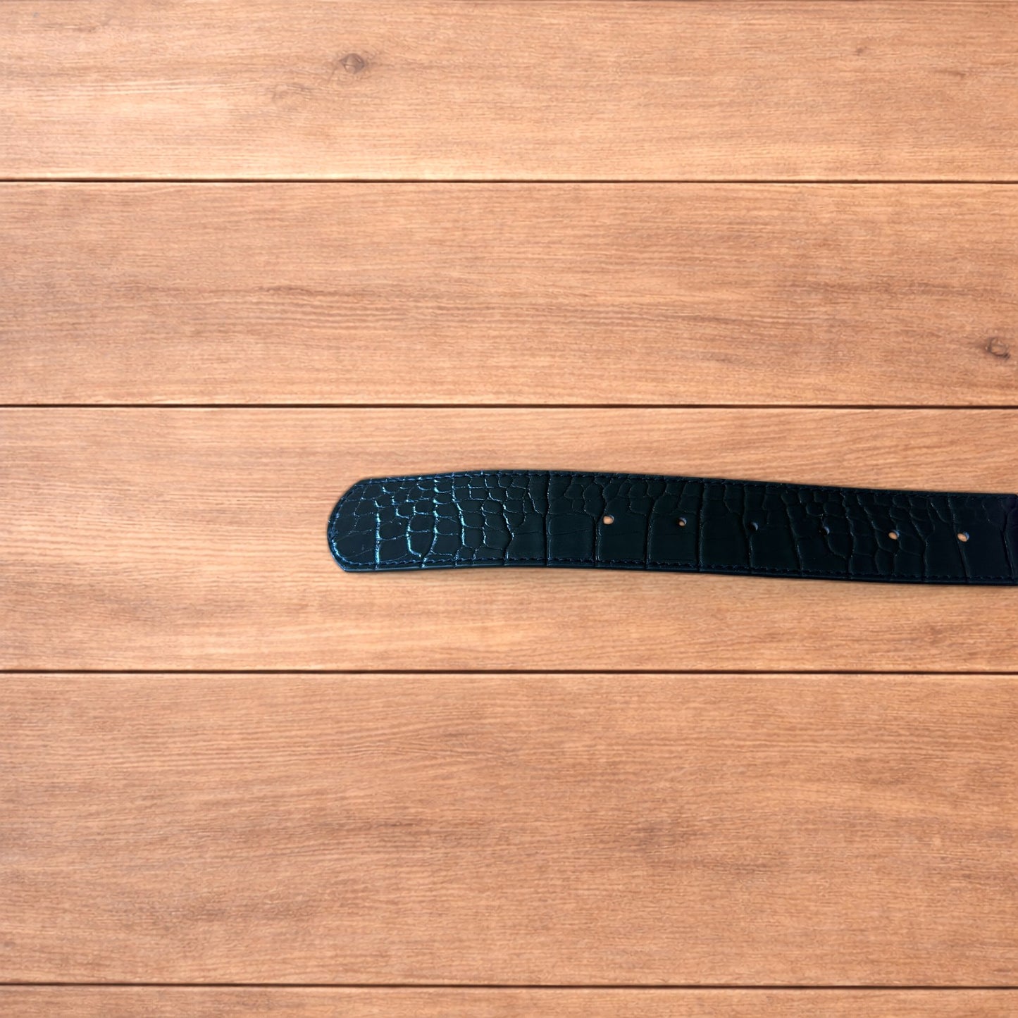 Vintage style faux leather snakeskin western cowboy belt in black with brass trim.