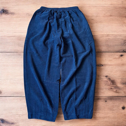 Super baggy wide leg skater corduroy trousers in navy blue.