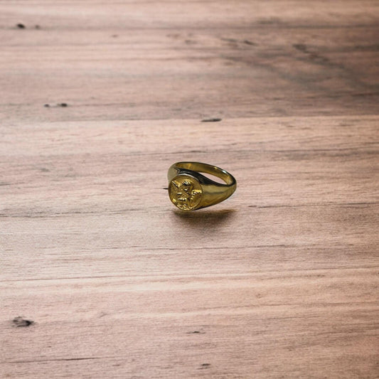 Lovely vintage style stainless steel angel signet ring in gold.