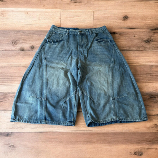 Incredible super baggy wide leg denim carpenter shorts jorts in mid blue wash.