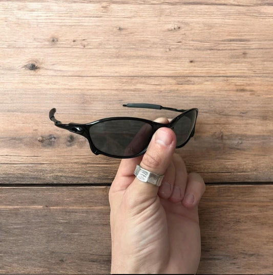 Insane metal frame sunglasses in black with black lense. One size.