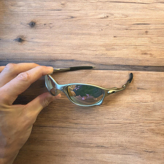 Insane metal frame sunglasses in silver with purple lense. One size.