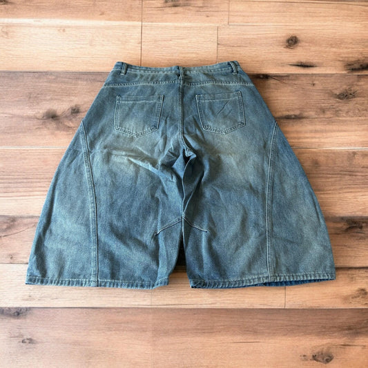 Incredible super baggy wide leg denim carpenter shorts jorts in mid blue wash.