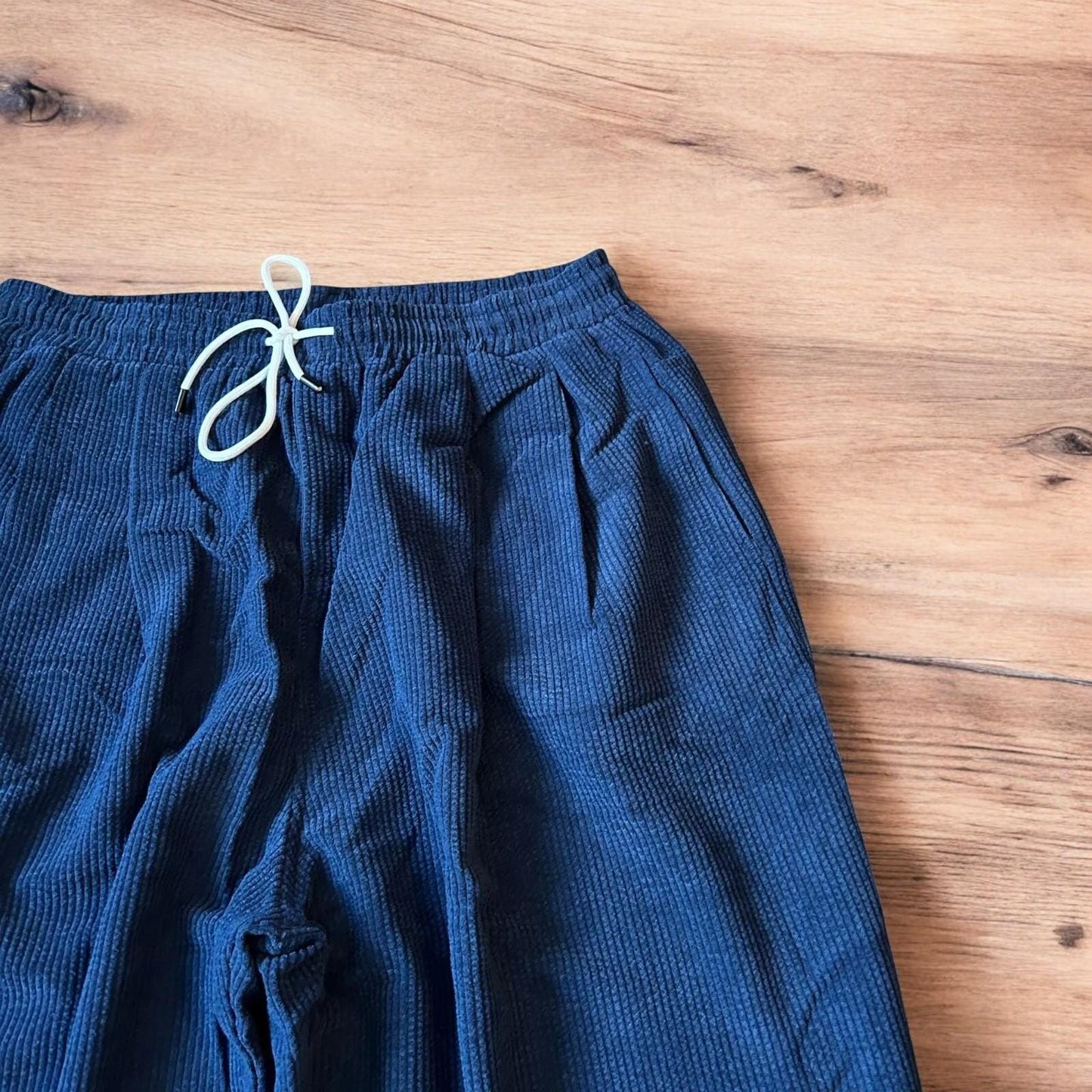 Super baggy wide leg skater corduroy trousers in navy blue.