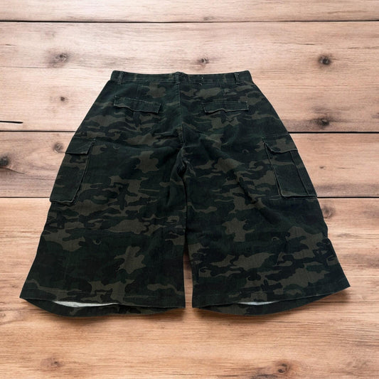 Super baggy wide leg cargo carpenter shorts jorts in army camo.